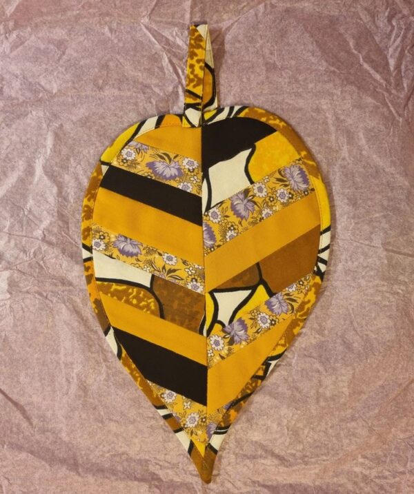 Grytlapp i Form av ett Löv